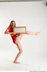 MARTINA BAYWATCH STANDING POSE WITH POINTER